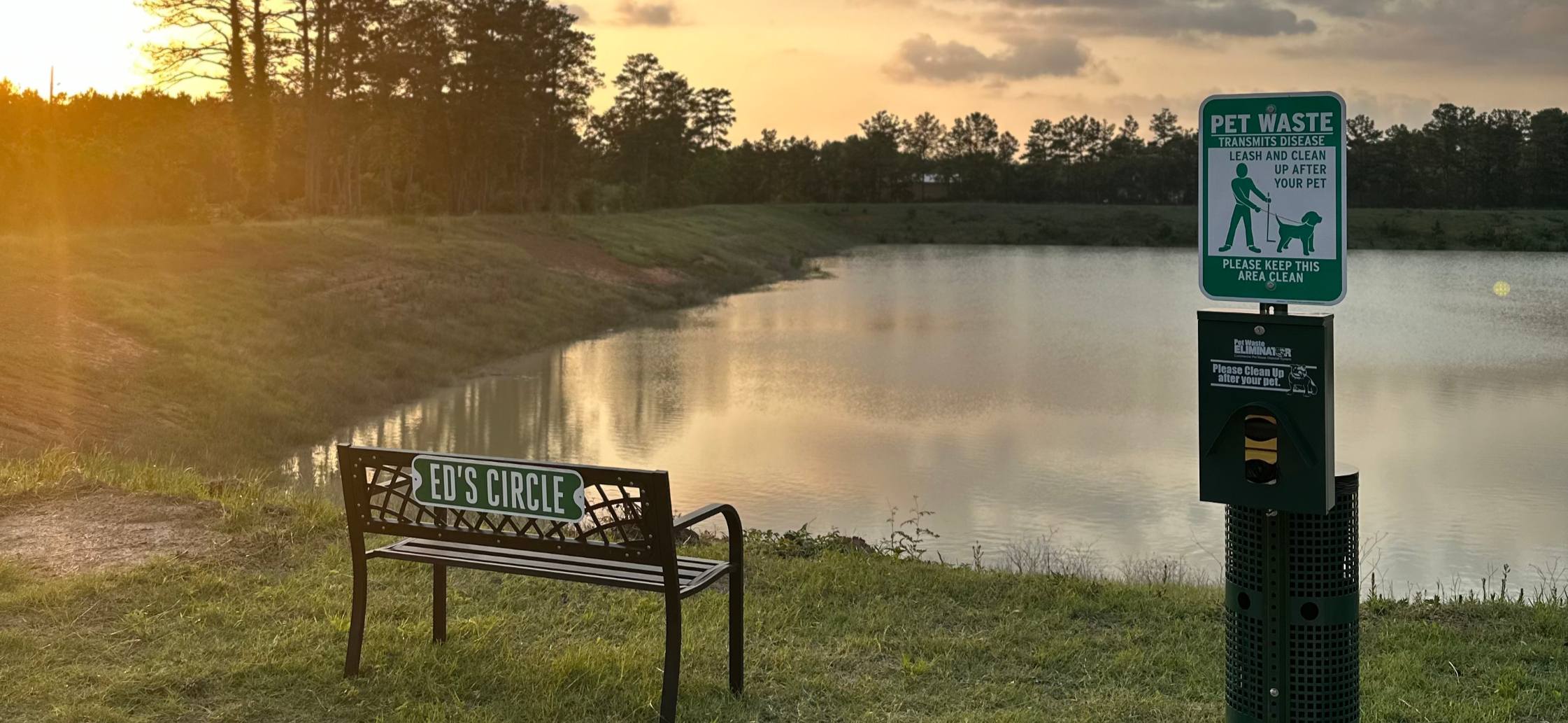 A picture of the sunset overlooking the lake at Ed's Circle