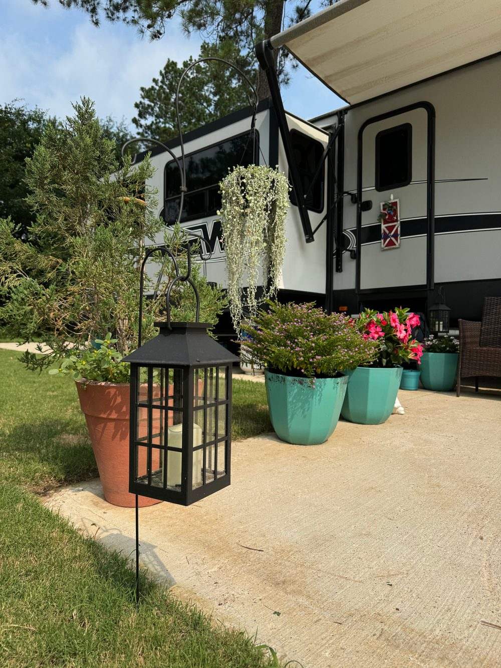 RV site at Hidden Lake RV Resort with landscaped decor