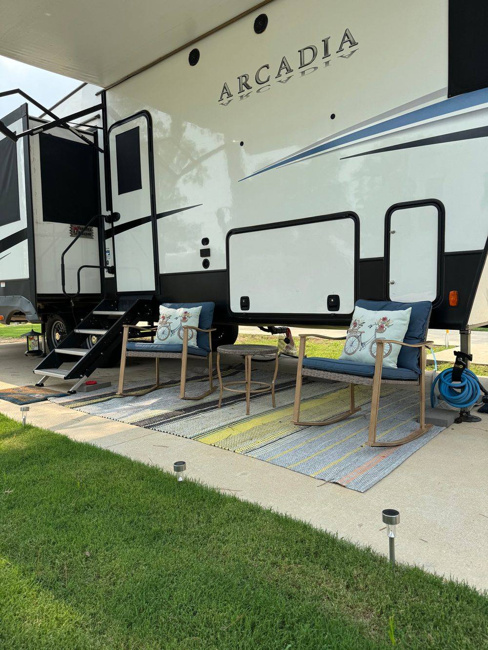 RV parked on a spacious site at Hidden Lake RV Resort