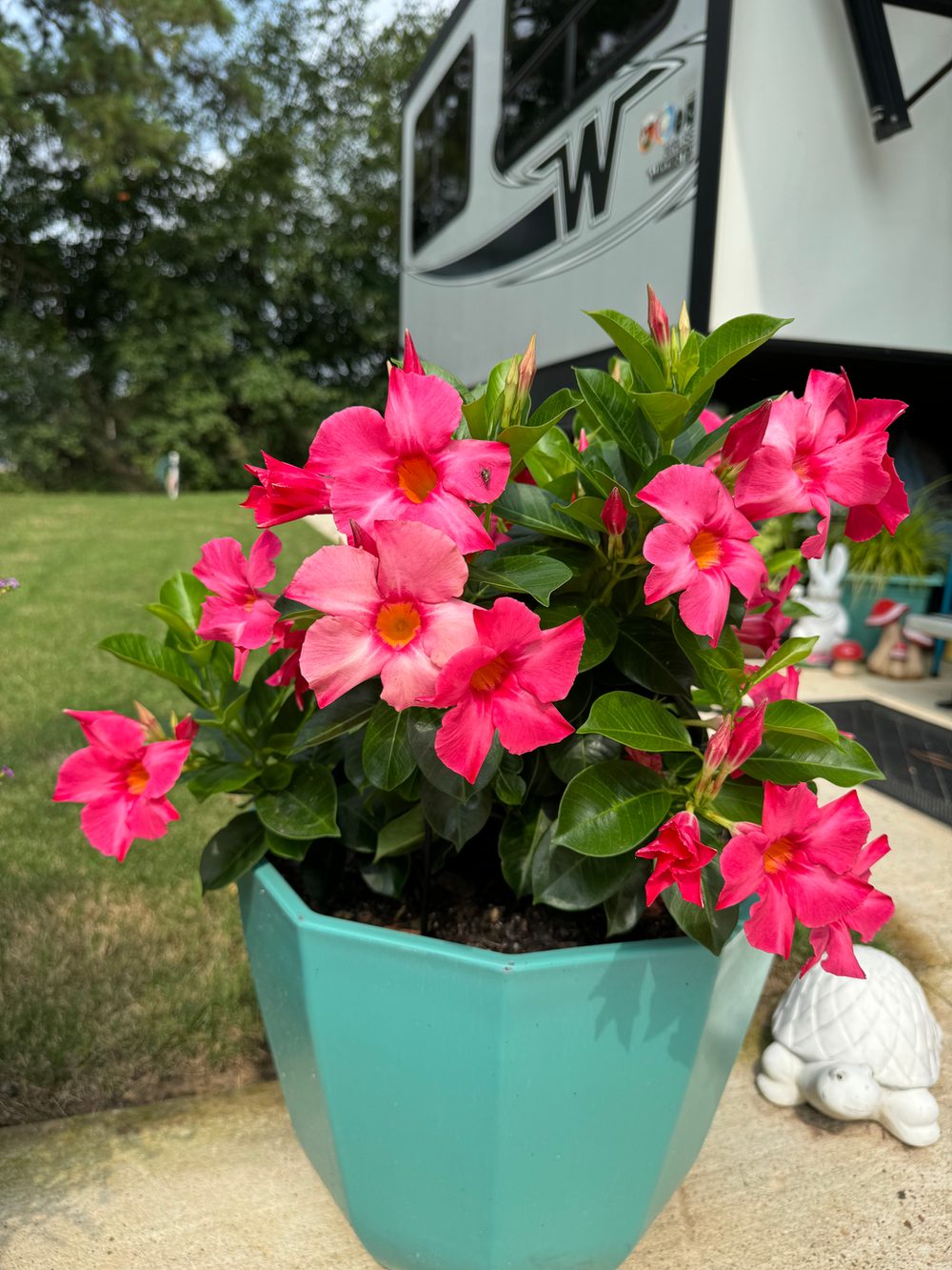 RV site with outdoor seating at Hidden Lake RV Resort