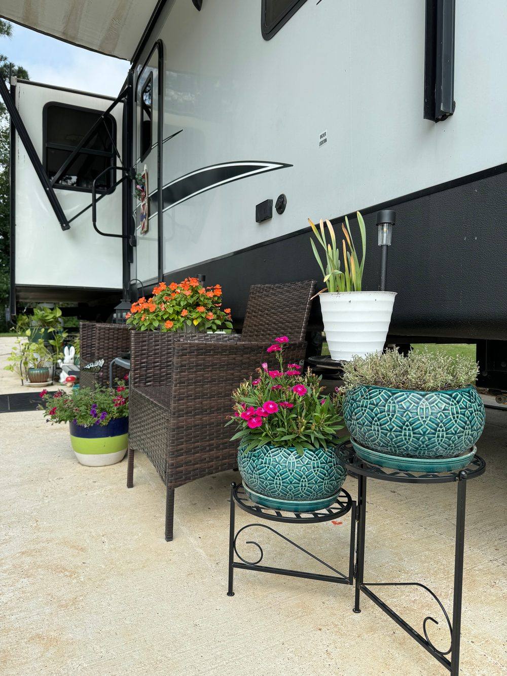 RV site with pine-tree shade at Hidden Lake RV Resort