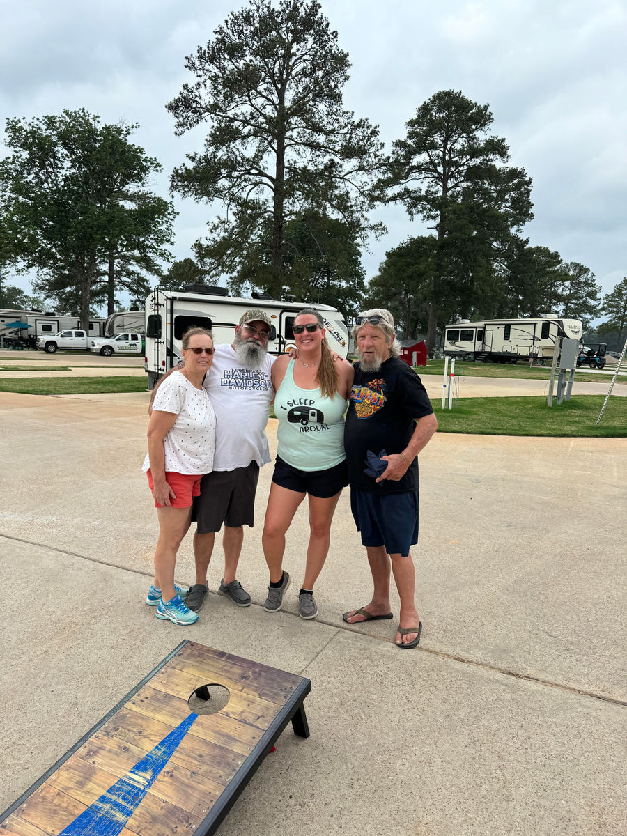 Picture of 4 of our guests at the April Cornhole Tournament